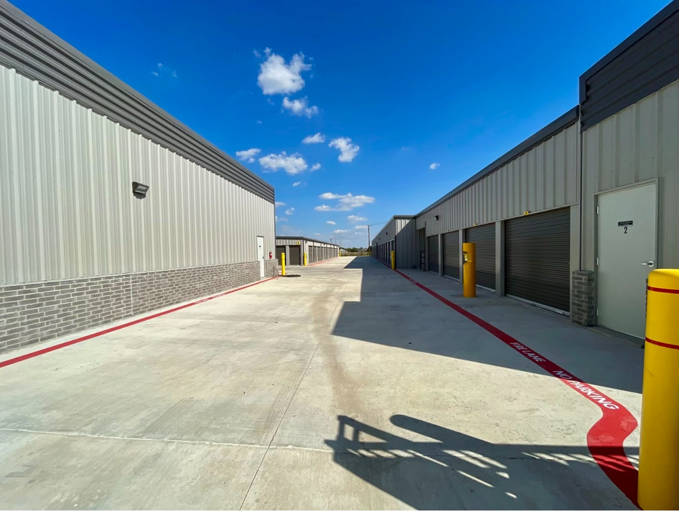Drive-up outdoor storage units with roll-up doors at Next Storage Killeen TX